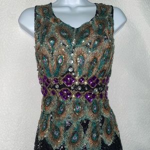 Green plume Sleeve Gown With Ruffled front & Back Tail